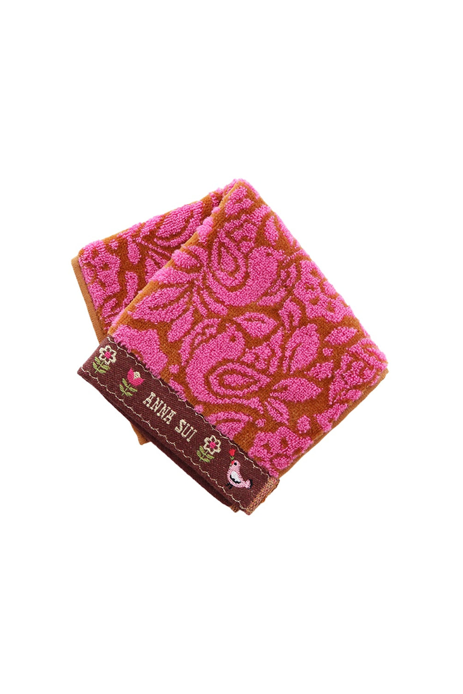 Birds of Paradise Washcloth, brown border bottom with Anna Sui label, a pink bird, line of flowers