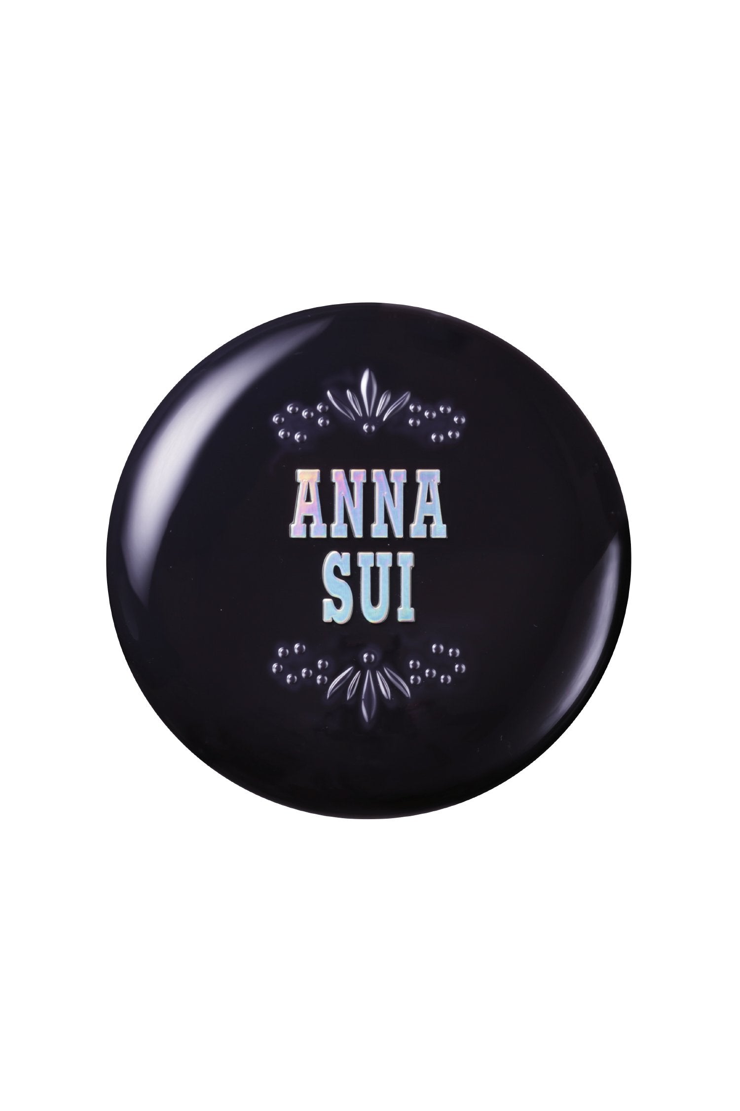 black round lid with Anna Sui on it with retro floral design