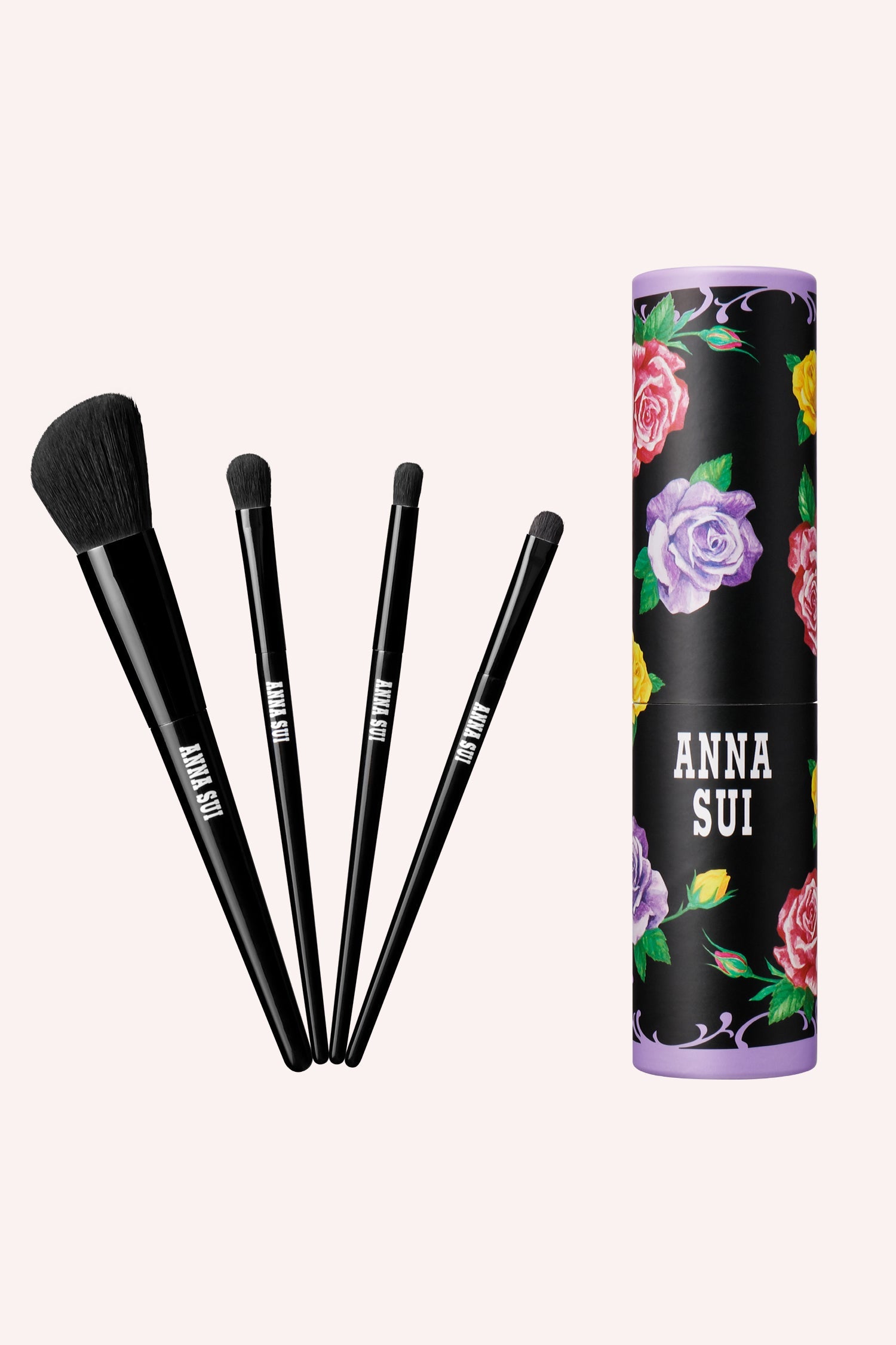 4 different brushes set in a floral paper tube, Cheek/Highlighter Brush. Flat, round, & point brush