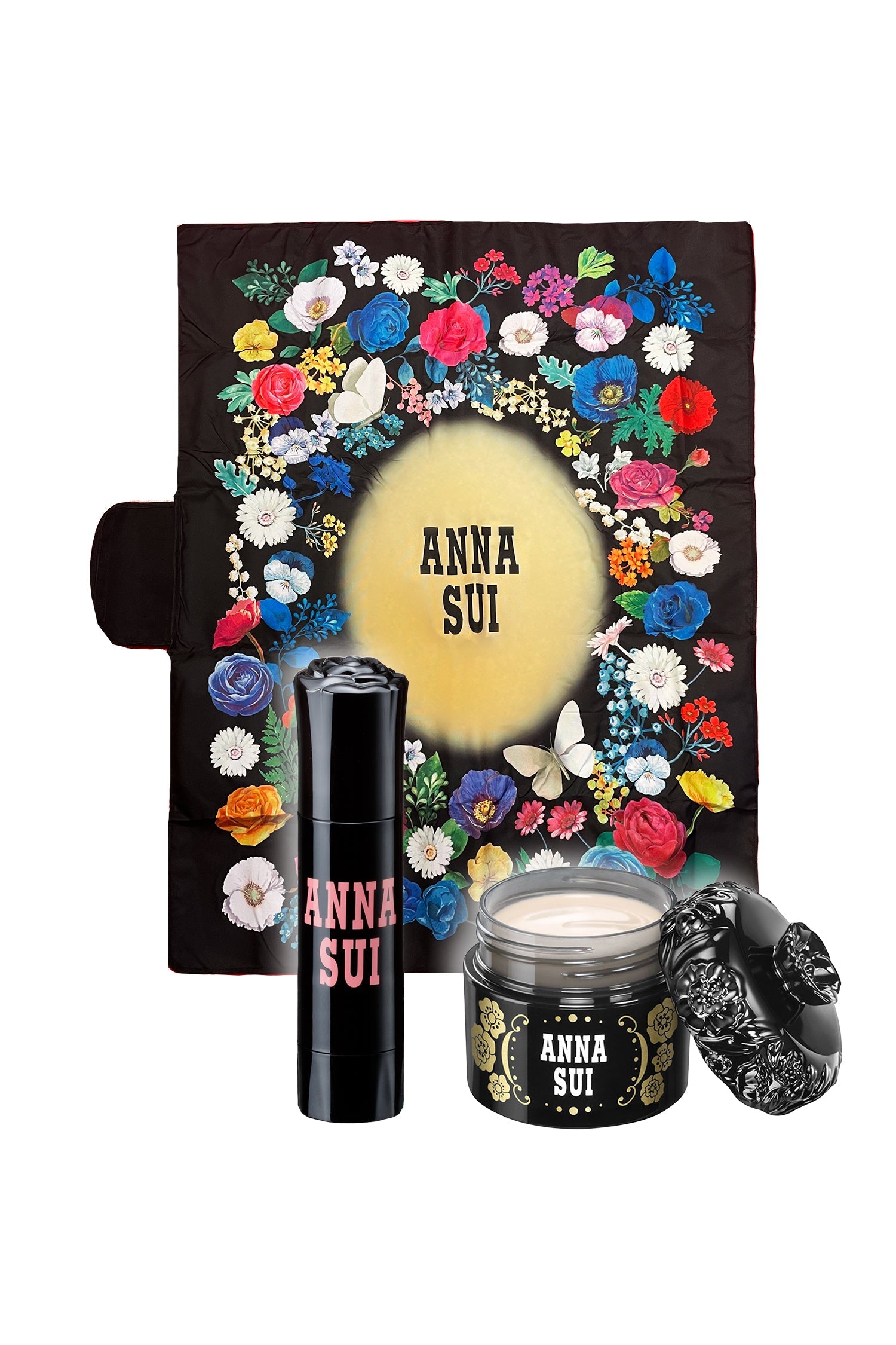 PEACH light cheek and primer set, the Anna Sui on cylinder case with a rose on top plus a black round case  