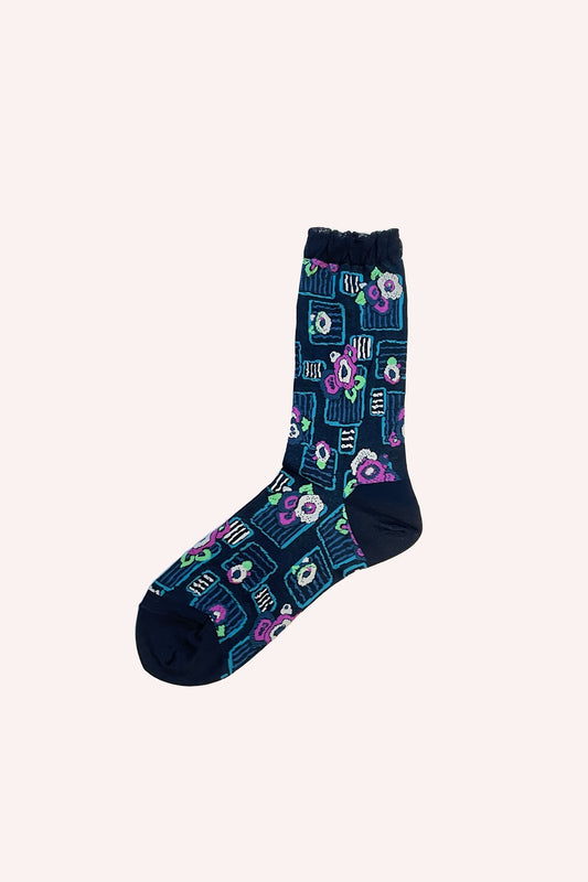 Deco Floral Patch Socks, on a black background, an blue/pink floral design in small square in blue