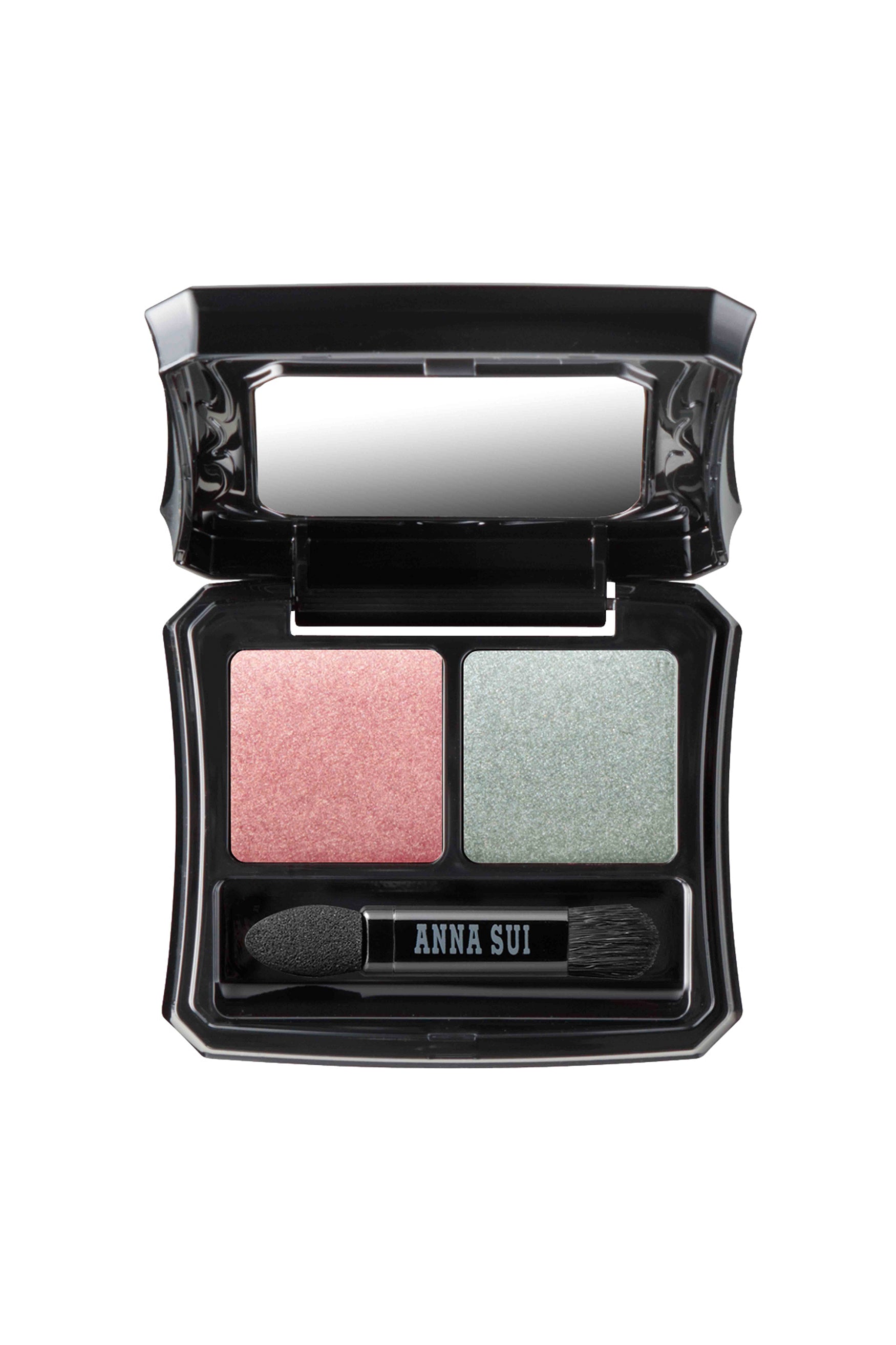 PETAL & LEAF in a square container with curvy sides, with Anna Sui applicator & mirror