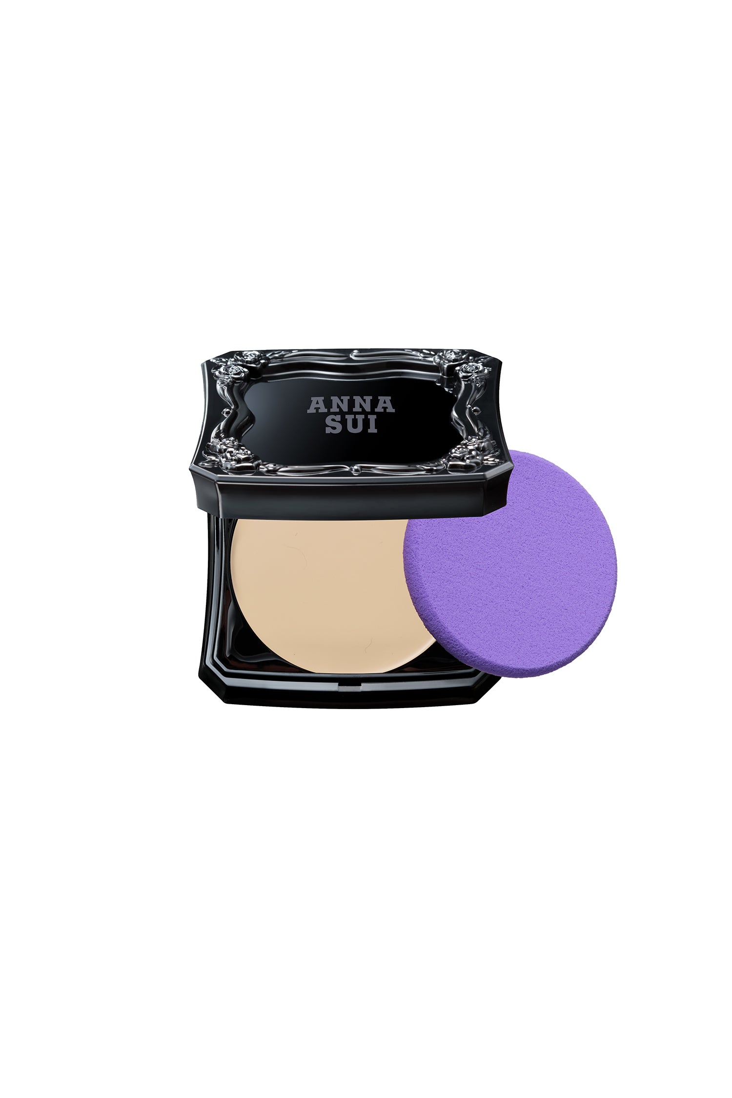 Anna Sui FAIR foundation in a black container with raised rose pattern and label, creates a flawless doll-like look