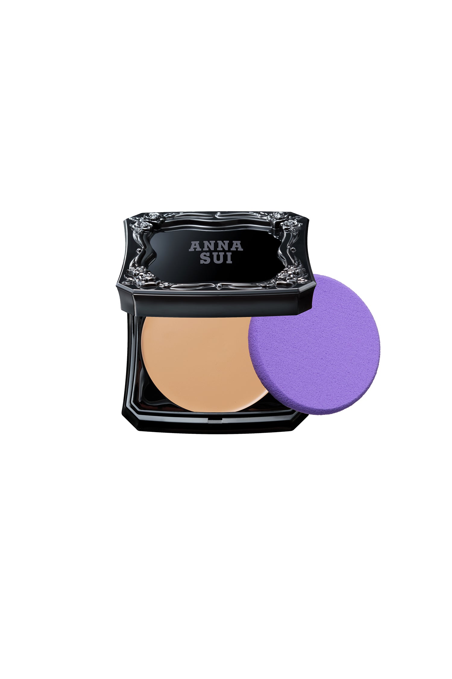 Anna Sui MEDIUM foundation in a black container, raised rose pattern and label, creates a flawless doll-like look