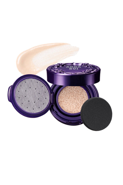 Purple round case raised rose pattern & label, liquid face powder & open lid, black cushion