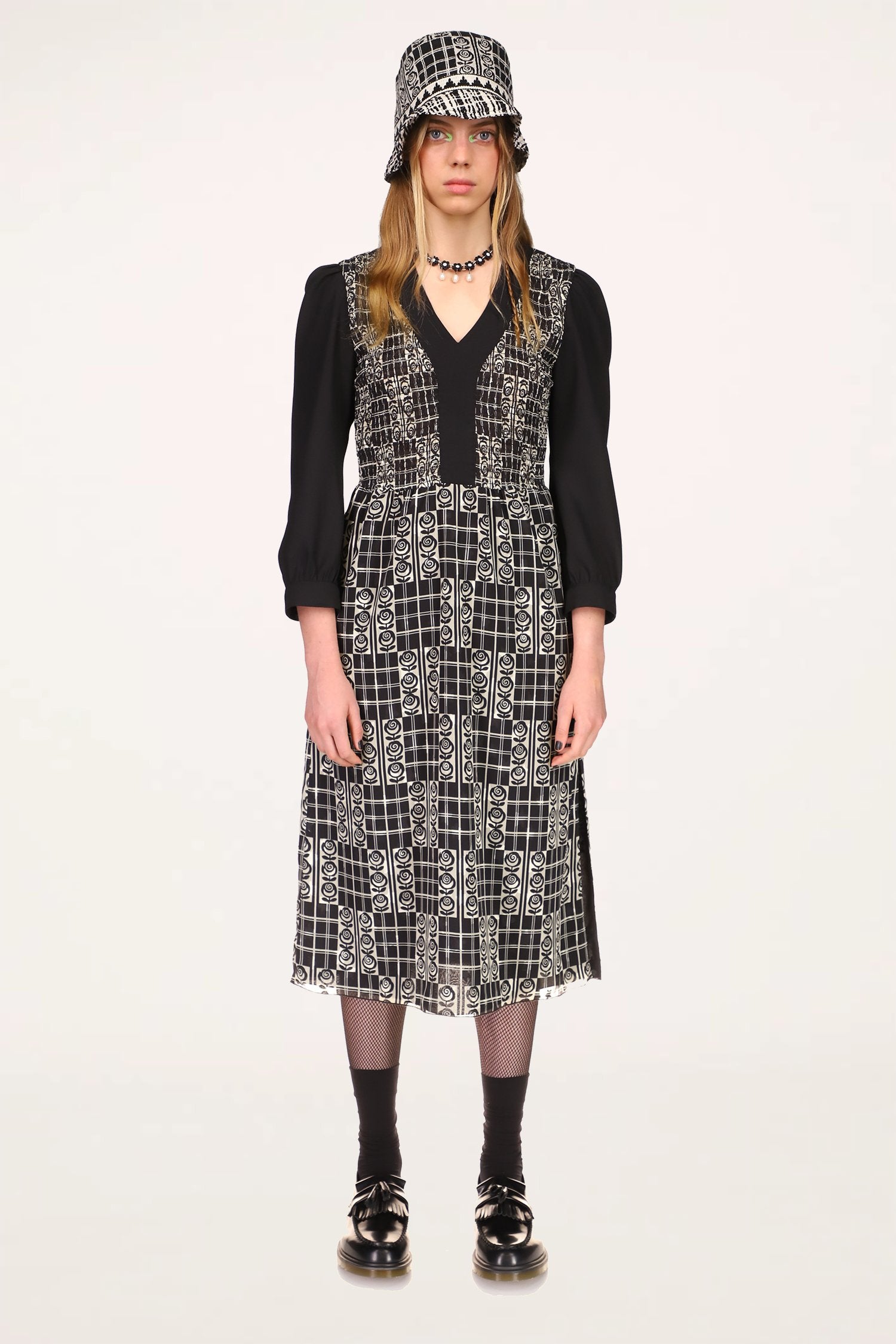 Rose Trellis Smocked Dress Black, mid-calf dress, V-collar cut with clack seams, long black sleeves
