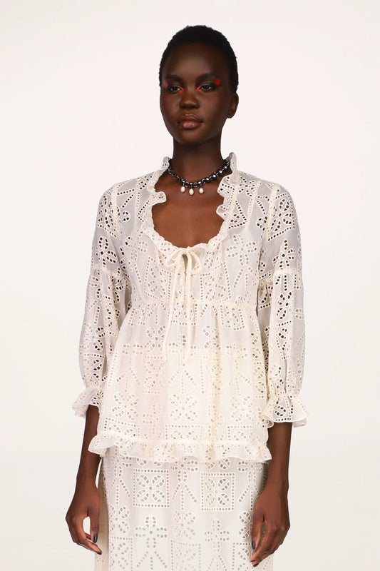 Eyelet Top Cream, ruffle like at round collar and bottom, mid-arms sleeves with ruffle effect 