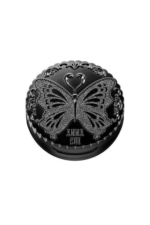 The Classic Loose Powder is a  black round box with a butterfly engrave on top, perfect for on the go and quick touch up