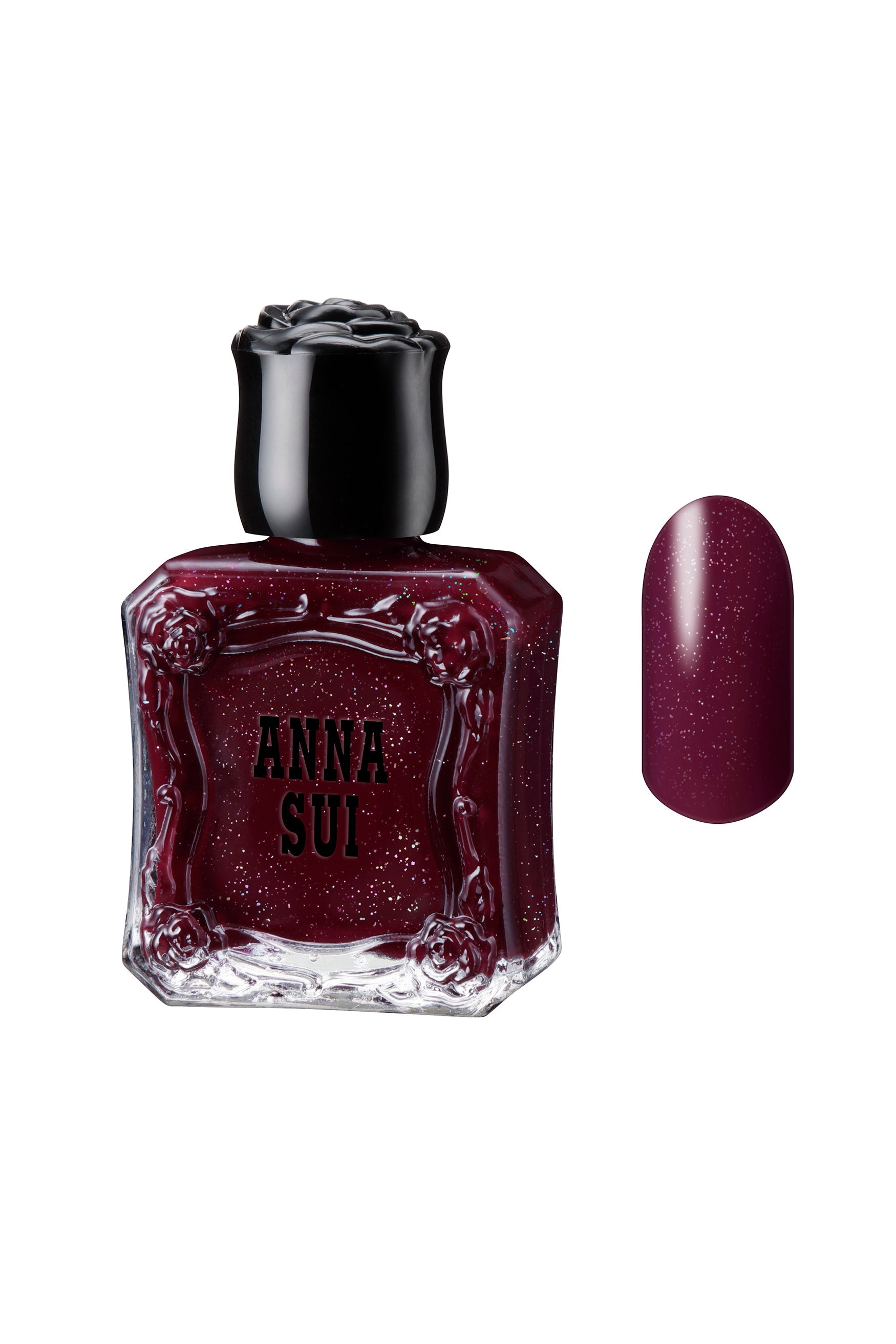 GARNET GLITTER: Glass bottles with a rose on the black cap are styled like Anna Sui perfume with a rounded brush
