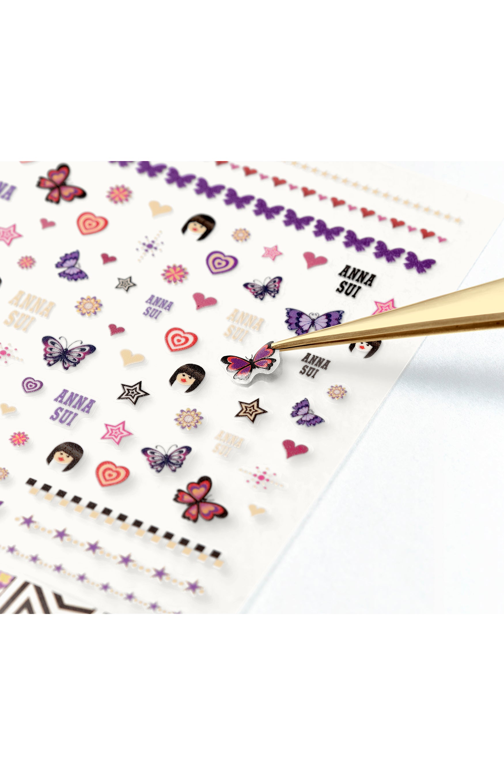 Decorate sheet of nails stickers, butterflies, hearts, stars, and iconic signature. Made with high quality adhesive