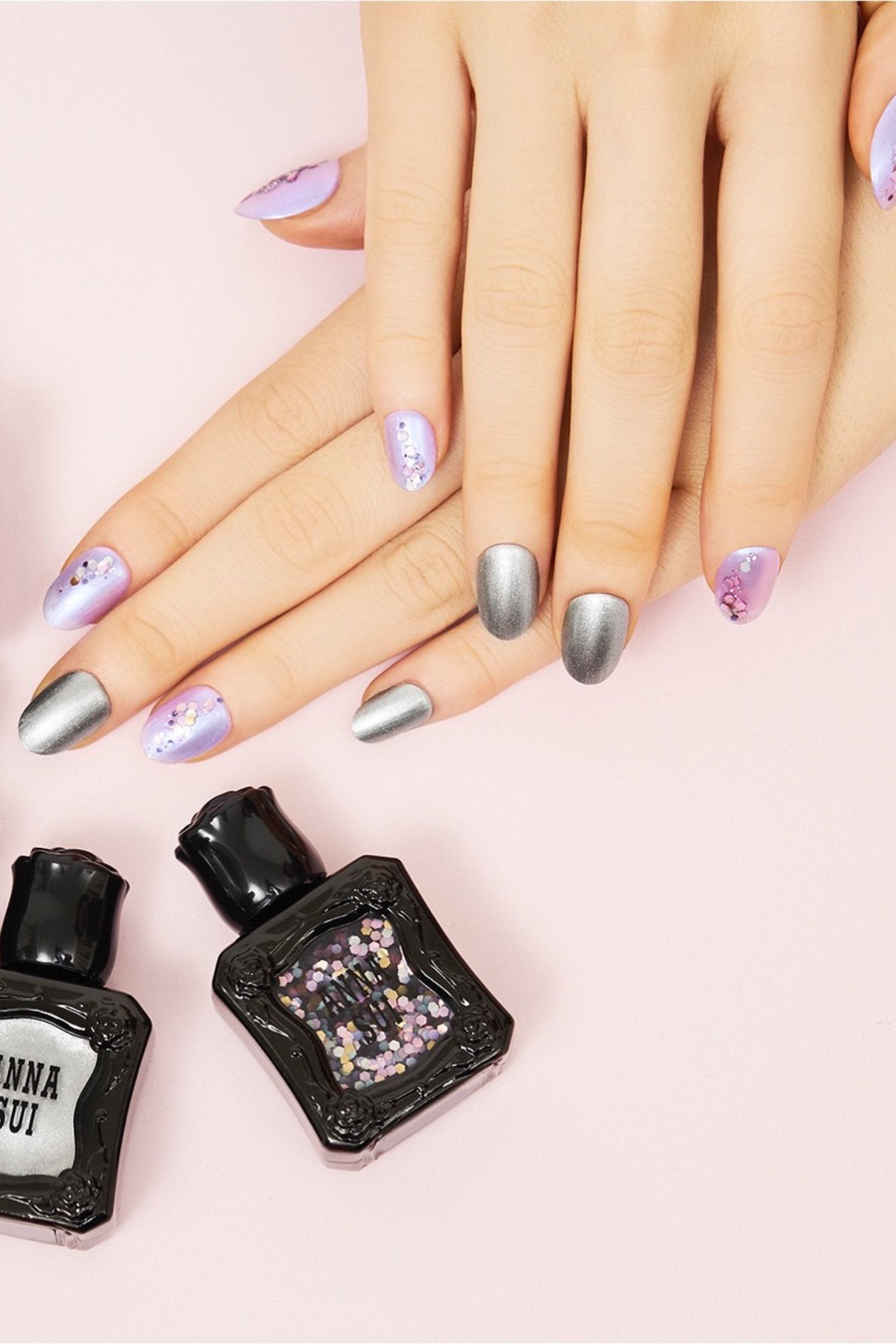 Hands with Nail Polish half and half, METALLIC SILVER,  SHINY PINKwith nail bottle, black container