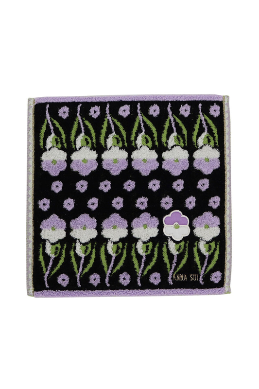 Washcloth black, 2lines of white/purple upside-down purple/white Pansy, Anna Sui label at bottom 