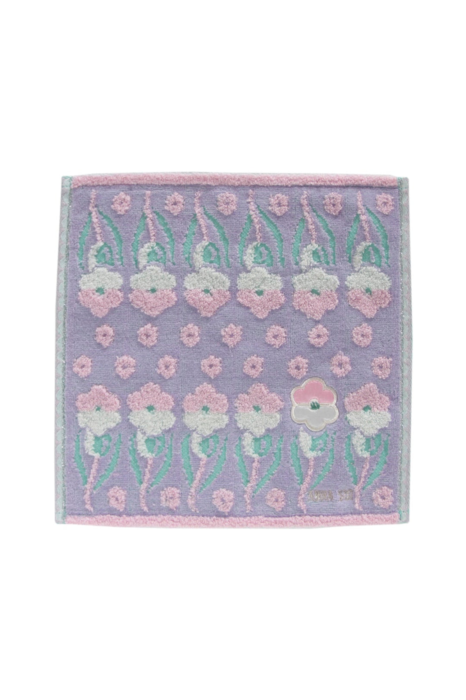 Other side of Pansy Panel Washcloth, black with 2lines of white/purple Pansy, Anna Sui label at bottom 