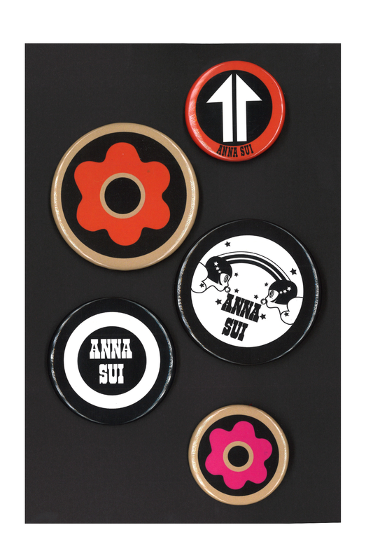 Pins, 1 red ring/white arrow, 2 different sizes golden ring/red flower, 1 black ring/bubblegum girls, 1 black ring/Anna Sui
