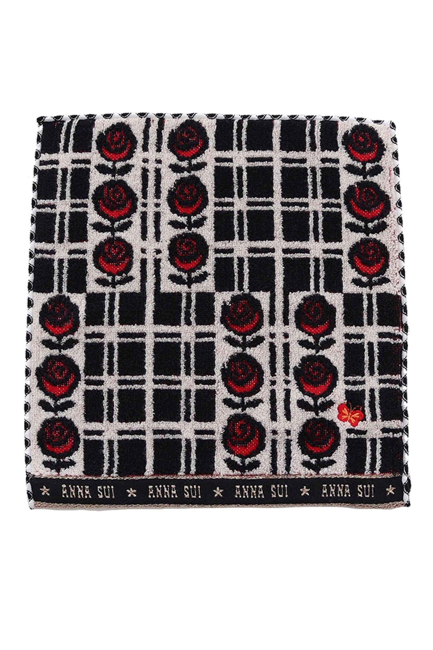 Washcloth, black with red roses on white, black border at bottom with white Anna Sui's signature
