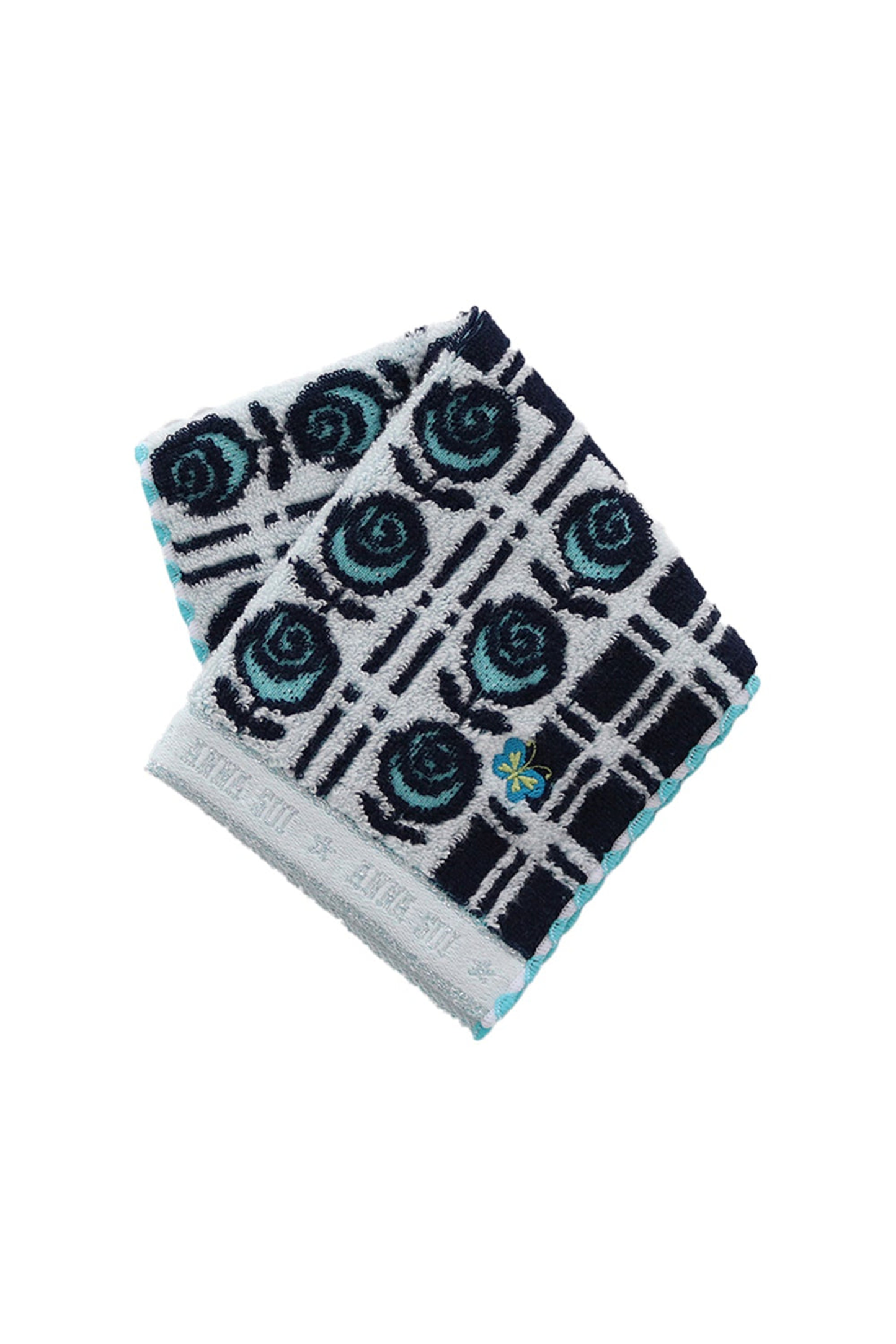 Washcloth, blue roses on white, black border at bottom white Anna Sui's signature, blue butterfly