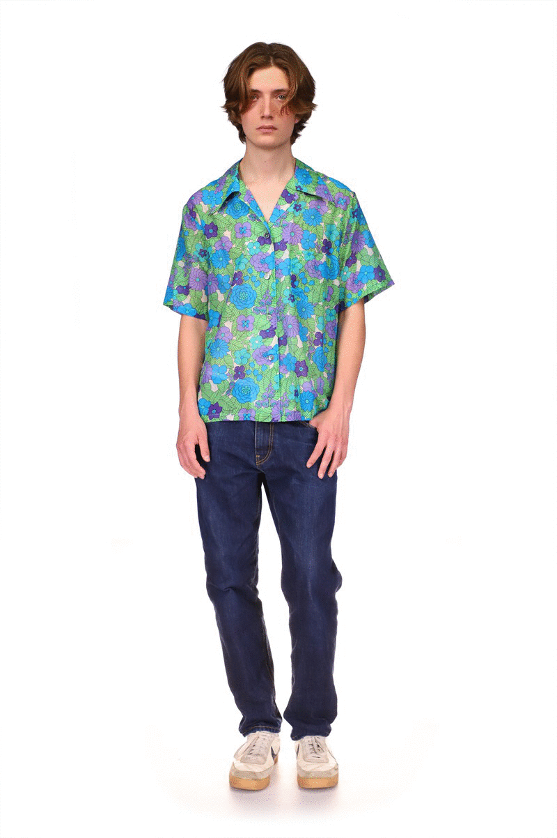 Beckoning Blossoms Button Down Top Orchid floral design in a greenish color, hip-length fit