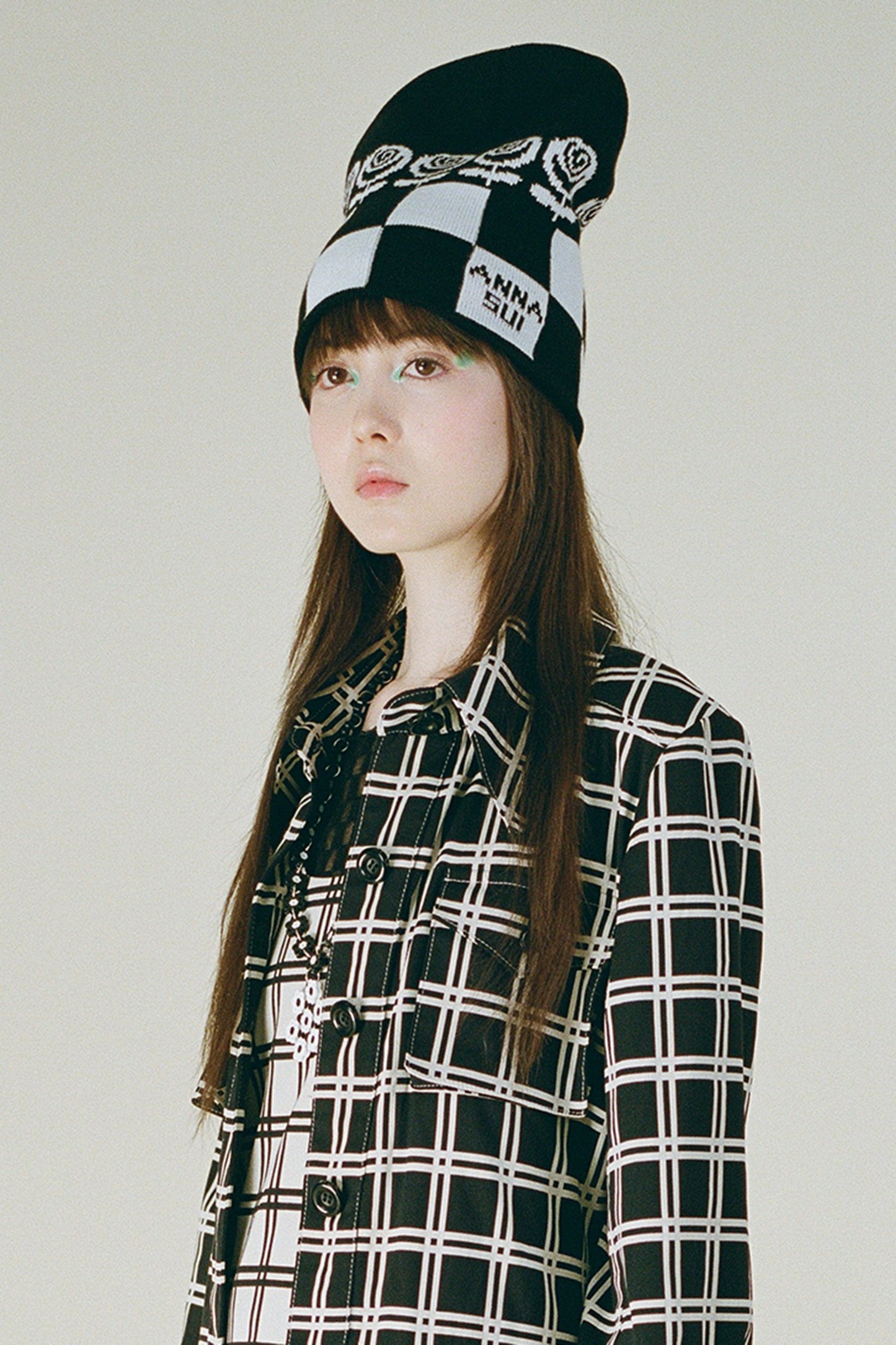 Rose Checker Beanie, black and white, with roses on top, Anna Sui in black in white square