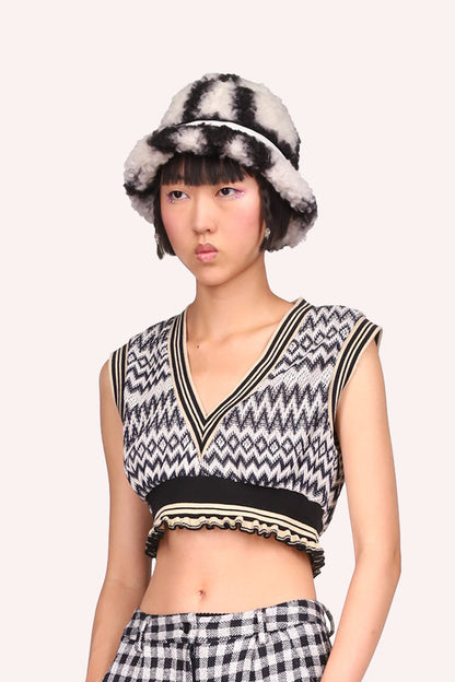 Windowpane Faux Fur Bucket Hat Black, black/white furry hat, with a white stipe around