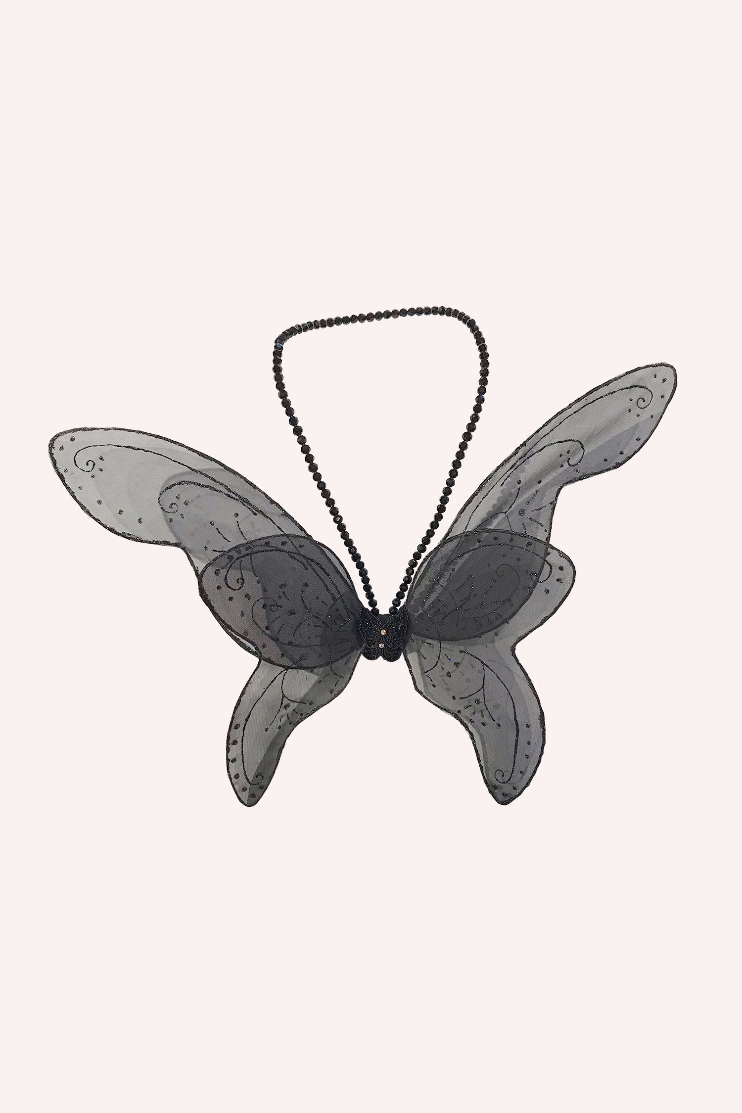 They are light black with black floral encrustations, 2 large and 2 smaller wings at the a shiny body center."